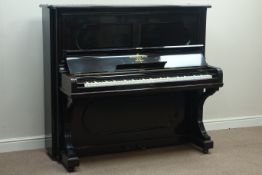 Steinway upright piano, iron framed overstrung movement with under damper & check tape,