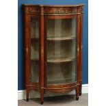 Late 19th century serpentine satinwood display cabinet, painted in Neo Classical style with cherubs,