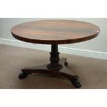 Regency rosewood circular tilt top breakfast table, turned column with carved baluster,