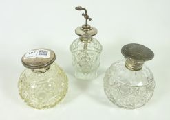 Early 20th Century cut glass atomizer the top stamped Sterling and two other cut glass scent