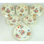 Set of six early 19th Century Derby plates hand painted with floral sprays and gilding (6)
