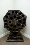 Eastern hardwood octagonal wine rack, tooled metal decoration, W78cm, H120cm,