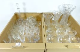 Three cut glass vases, a mallet shaped decanter,