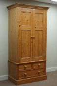 Solid pine double wardrobe, panelled doors, two short and one long drawer, W102cm, H197cm,