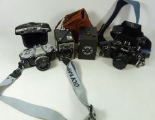 Canon AE-1 Program SLR camera with 50mm lens,