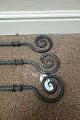 Three wrought iron curtain poles, hand forged crook finials,