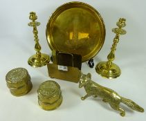 Two brass wheel hubs, pair of brass candle sticks, brass letter rack,