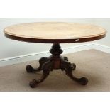 Victorian inlaid walnut loo table, oval tilt top, carved base with four splayed legs, 145cm x 108cm,