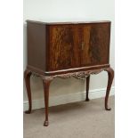 Mid 20th century mahogany cocktail cabinet, cabriole legs with carved frieze,
