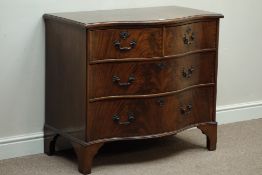Early 20th century mahogany and mahogany banded serpentine chest, two short and two long drawers,
