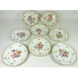 Set of six 20th Century Dresden dessert plates and two leaf shaped dishes hand painted with foliage