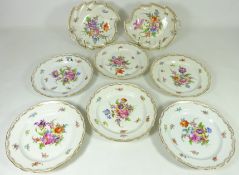 Set of six 20th Century Dresden dessert plates and two leaf shaped dishes hand painted with foliage