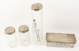 Four cut glass dressing table jars with hallmarked silver tops and hat pins Condition