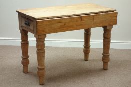 Victorian pine kitchen table with single drop leaf, on turned base with end drawer,