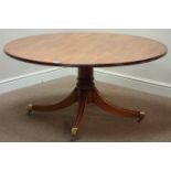 Rink of Harrogate yew wood circular rising coffee/dining table, revolving adjustable height top,