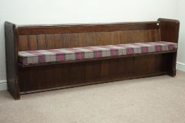 Late 19th century oak church pew with seat cushion upholstered in tartan,