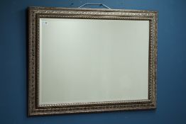 Gilt framed mirror with bevelled glass,