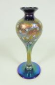 Okra glass vase, multicoloured decoration with white enamel flowers on a blue and bronze ground,