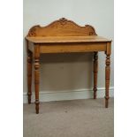 Early 20th century oak side table, shaped carved back, on turned base, W87cm, H96cm,