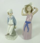 Lladro 'Boy with a Yacht' and 'Coy Girl' (2) Condition Report <a href='//www.