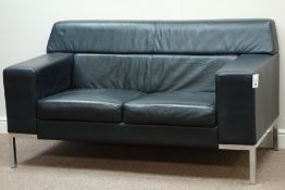 Two seat sofa upholstered in black leather, chrome 'L' bracket feet,