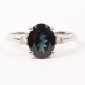 Platinum ring set with blue Mahenge spinel (Tanzania) and two diamonds hallmarked