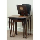 Nest of three Mahogany tables and a magazine rack with coat of arms Condition Report