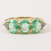 Rings set with Siberian emerald and diamond shoulders hallmarked 9ct gold Condition