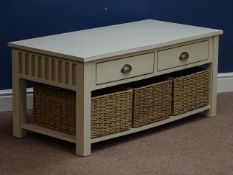 Cream painted rectangular coffee table with two drawers and three baskets underneath, 111cm x 52cm,