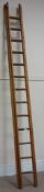 Double extending wooden ladders,