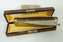 Hohner 'Chromonika lll' Harmonica and Wade Baby Tortoises,