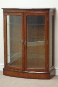 Reproduction walnut bow front display cabinet, bevelled glass, three adjustable shelves, W82cm,
