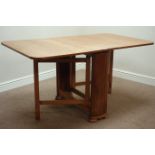 Mid 20th century drop leaf dining table (H76cm, 84cm x 148cm (open)),