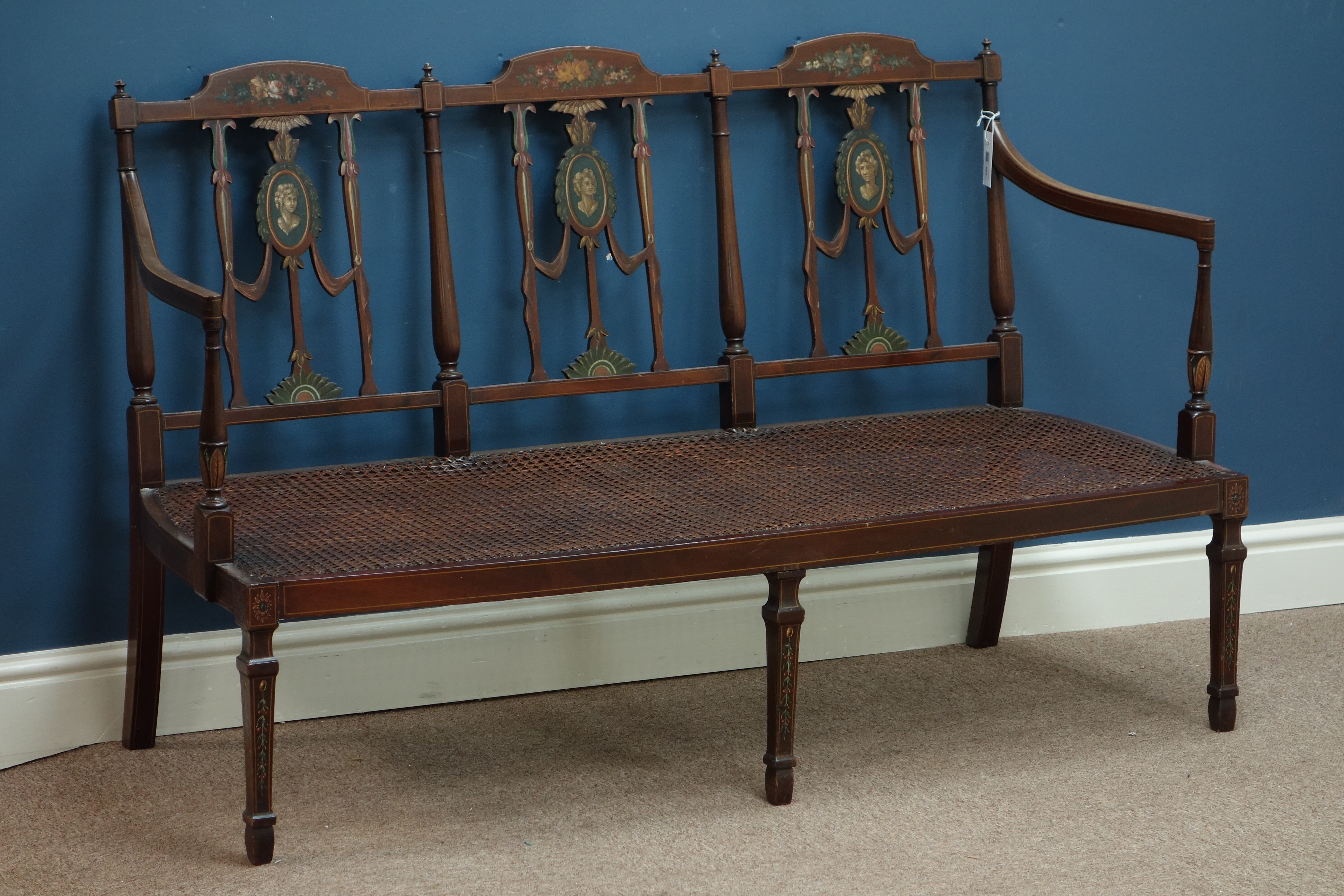 Edwardian inlaid mahogany settee, Neo classical style painting, cane seat with upholstered cushion,