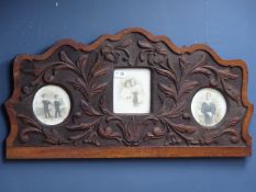 Early 20th century oak picture frame carved with foliage and similar wall hanging bracket
