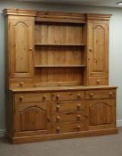 Waxed pine dresser fitted with six drawers and two cupboard to the base,