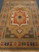 Kabir beige ground rug, geometric design with square pole medallion,