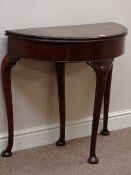 Reproduction mahogany demi-lune fold over card table, cabriole legs with single pull out action,