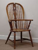 Early 19th century double bow Windsor armchair, stick and splat back,