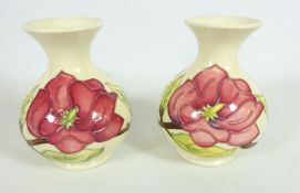 Pair of Moorcroft Magnolia pattern vases,