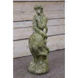 Composite stone figure of a seated maiden,