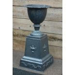 Regency style silver finish cast iron urn on plinth, D43cm,