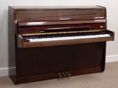 Legnica upright piano in lacquered teak case, iron framed and overstrung,