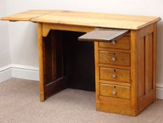 Early 20th century oak child's pedestal desk, four drawers and slide, drop leaf, W91cm, H66cm,