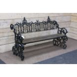 19th century heavy cast iron garden bench, scrolling foliage end rails,