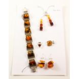 Baltic amber seven panel bracelet stamped 925, a necklace,