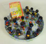 Collection of Robinson Golly figures and Robinson Golly badges and related items in one box