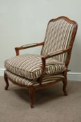 French style walnut framed armchair upholstered in striped fabric