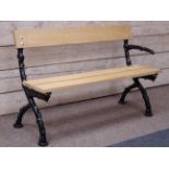 Victorian black painted cast iron bench with refurbished oak slats,