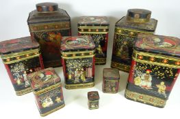 Large oriental style tea caddy shaped tin and a set of eight similar tins in one box